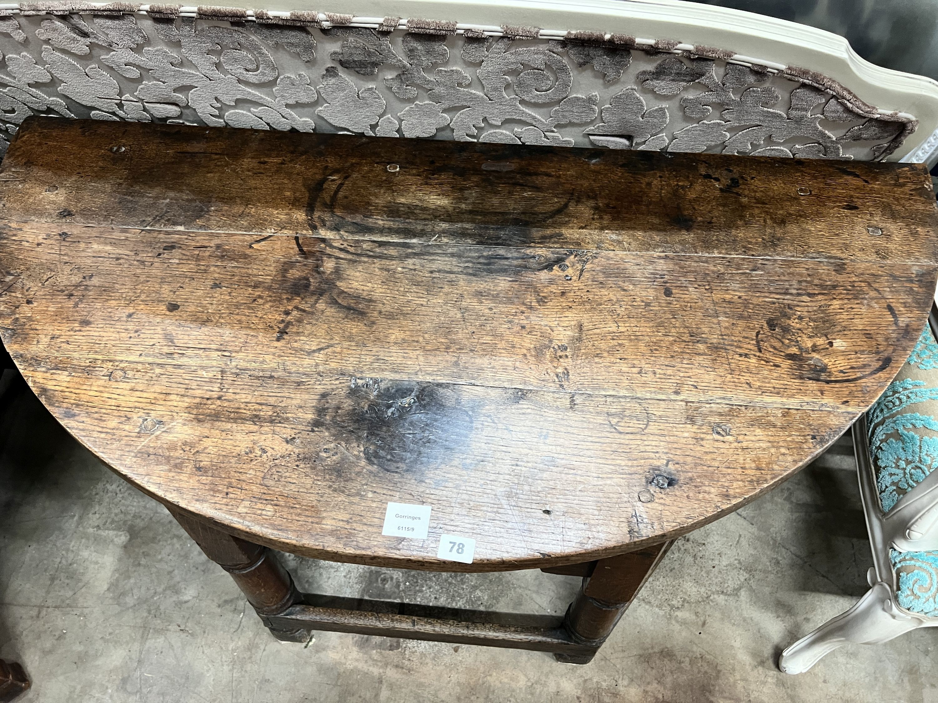 An 18th century oak D shaped side table, width 120cm, depth 58cm, height 71cm